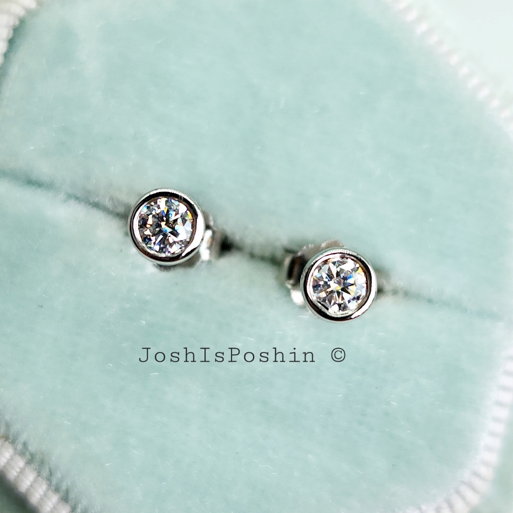 Bezel Moissanite stud earrings in rhodium over sterling silver